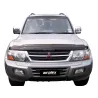 Protection phare Pajero 00 avant 06